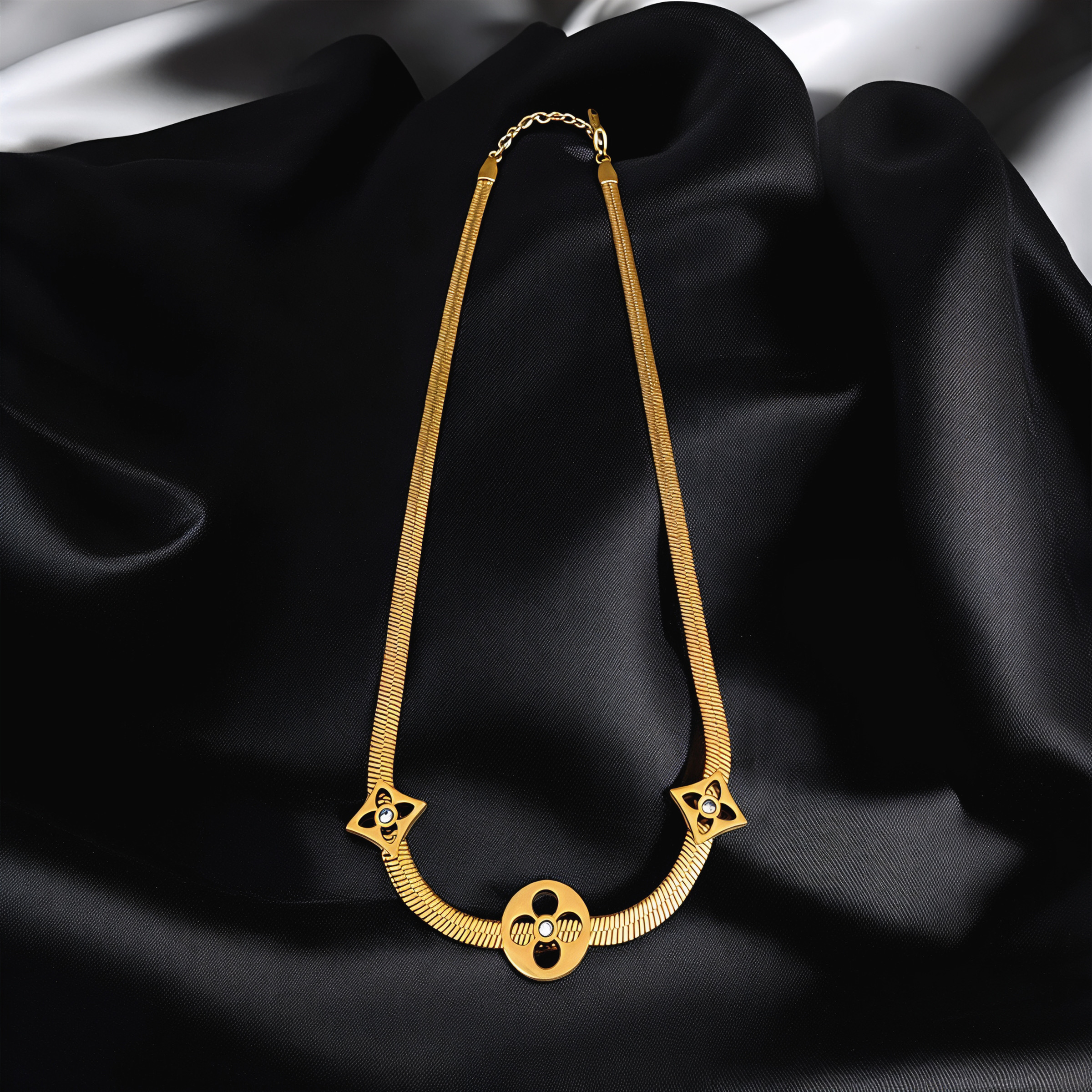 elegant gold chain with round geometric pendant