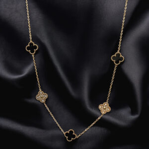 Elegant gold necklace with crystal-studded geometric charms